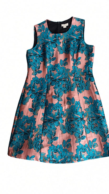 Front of the sleeveless Monsoon floral dress laid flat, showing its round neckline, fitted waist and A-line skirt.
